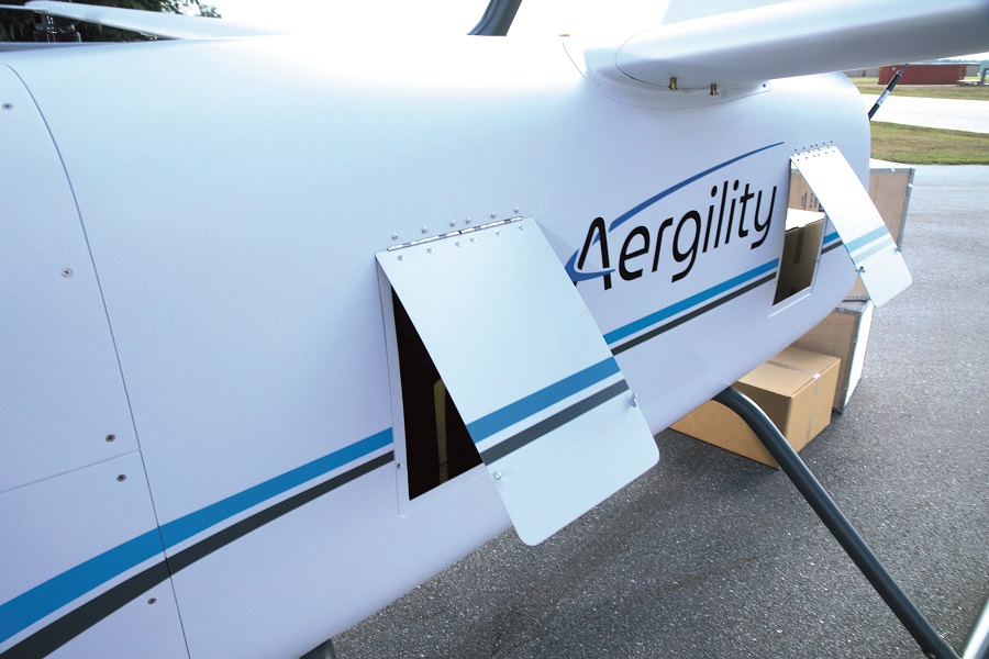 Latched side doors open as needed for easier loading, unloading or strapping down parcels