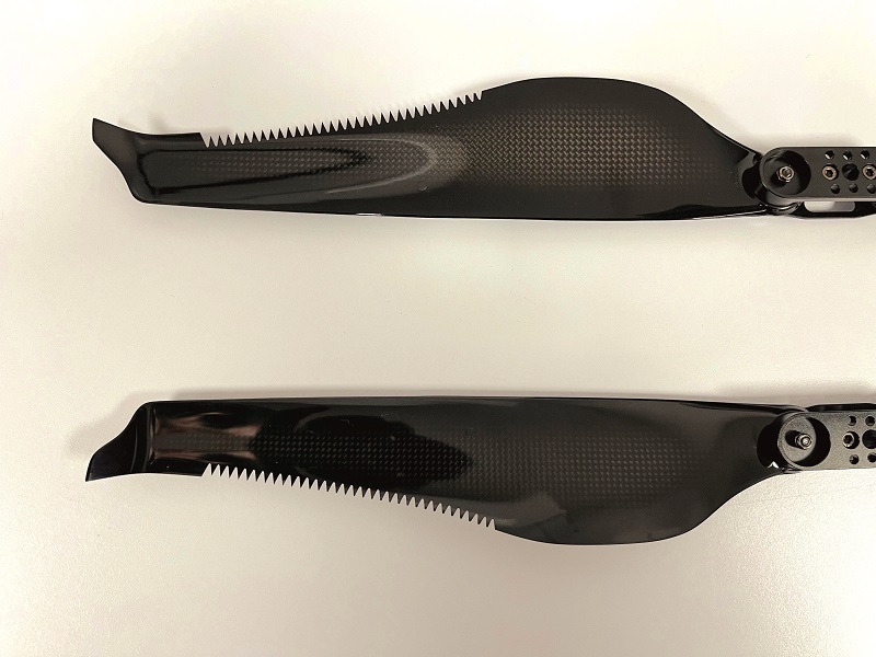 In addition to using conventional propellers that fold, and feature winglets to reduce noise, the UAV can also be equipped with serrated props (pictured)inspired by owl wings for even quieter flight