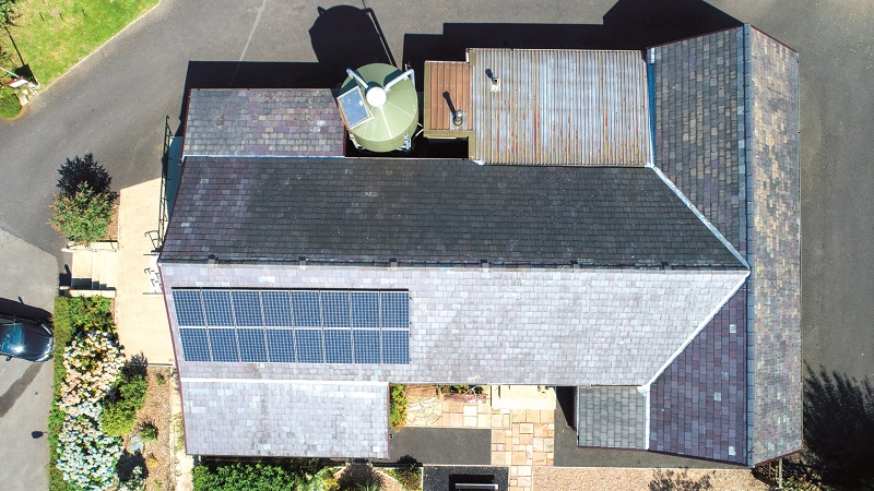 The roof of Bleasdale Parish Hall, in northern England, with its two strings of PV panels, a 50% drop in the output of which led its owners to contract a thermal survey