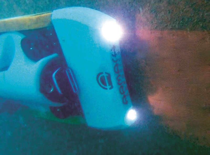 The HSR in action, using its rotary brushes to clean micro-fouling from the surface of the hull without damaging the paint, and using hull-relative navigation to find its way