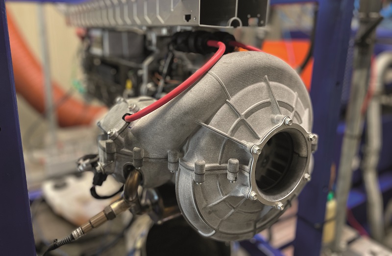 The use of additive manufacturing has been key to the design of the cooling housing, with future use of AM potentially enabling metal or composite housings