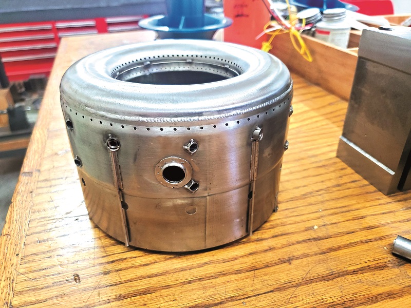 ...before entering the burner, which is designed with a re-light capability up to 20,000 ft