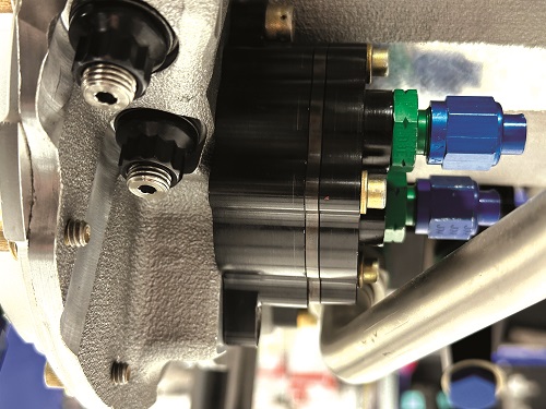 Fuel delivery into the DHK180 starts from a low-pressure pump atop the engine (above), which draws fuel from the UAV’s tanks and sends it to a high-pressure fuel pump (right), which contains four independent plunger-barrel and steel line systems; one for pumping fuel to each cylinder
