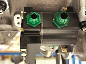 The oil pump integrates a high-power scavenge pump to recover oil via the bedplate, whether the engine is installed as an inverted-vee or an upright-vee