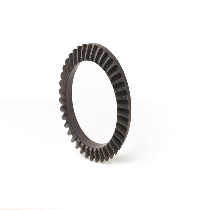 In the XMD-250, gears such as this one are installed beneath the cylinder and atop the output shaft, driven by the gears on the two cranks