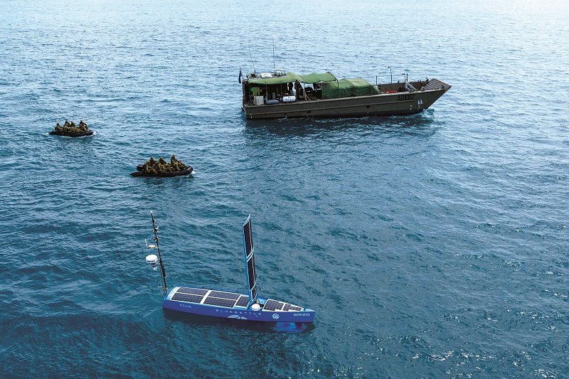 Ocius Technology’s Bluebottle sail- and solar-powered USVs can deploy a towed array sonar to increase its target-detection range. The sail folds down (Image courtesy of Ocius Technology)