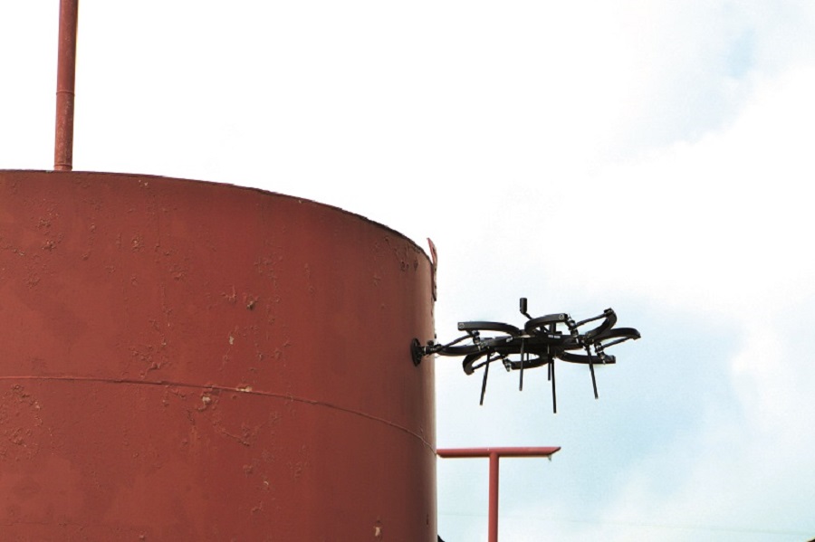 Programming intelligent rotor responses, engineering sufficient airframe stiffness and smart cable management were all crucial to making the UAV hold still during physical inspection