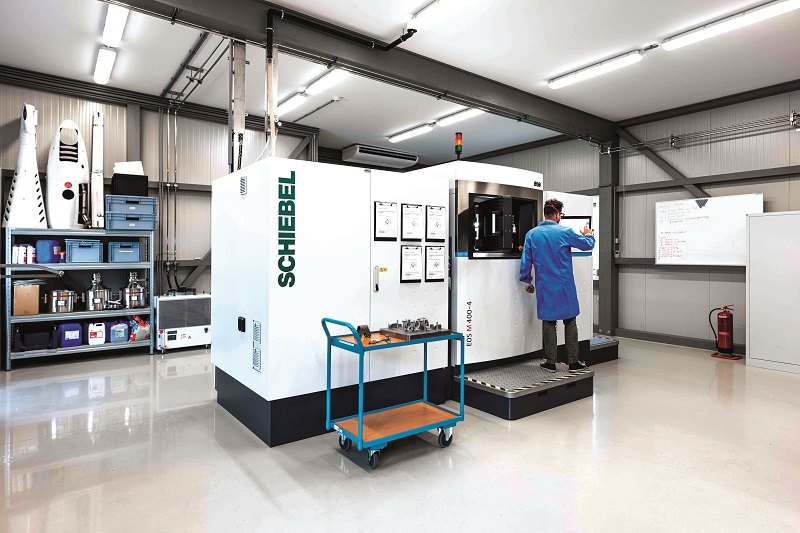 Metal additive printers such as this one are used to manufacture the S-100’s titanium rotor head