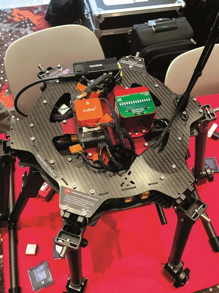 SiPhOG miniature inertial-sensor package, pictured to the right of the Cube autopilot
(Images courtesy of Peter Donaldson)