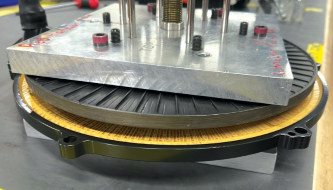 As the ironless rotors spin about the ironless stator, a surface friction effect impels air into the rotor-stator gaps. The air runs circularly and turbulently to cool them before being ejected by centripetal force