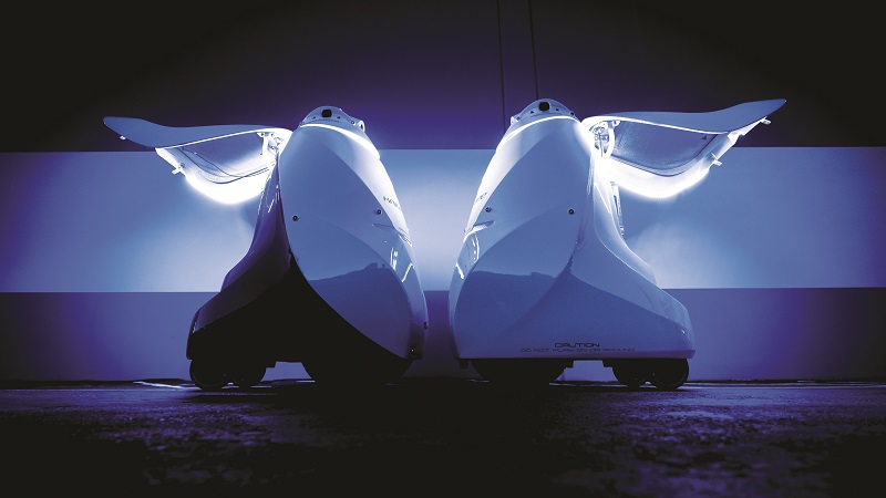 A pair of K5s with their rear maintenance access doors open. Along with the head and body, the door is one of the primary structural modules in the latest version of the robot
