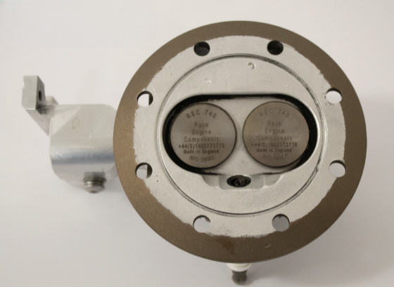 A pair of overhead poppet valves, made of steel with a pulsed plasma nitriding treatment, govern intake and exhaust