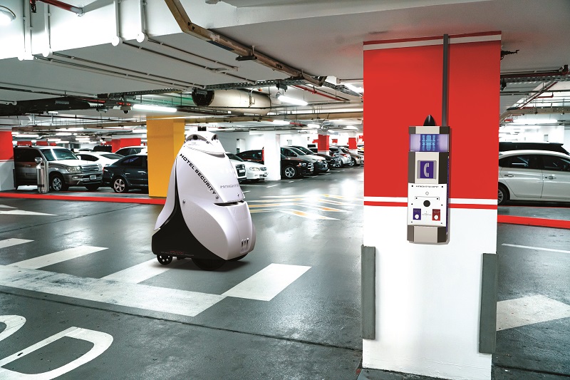 K5 on patrol in a hotel’s underground car park, pictured with one of Knightscope’s emergency phones. It can cope with gradients of up to 20%