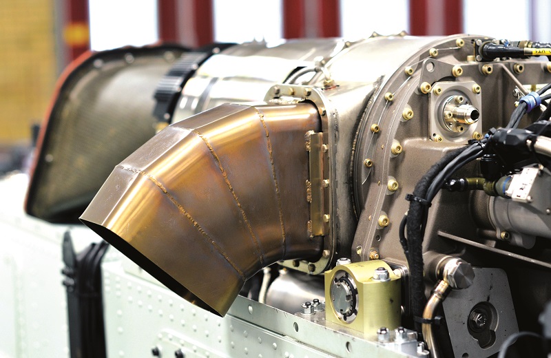 The engine sits over the central part of the fuselage, with the autopilot beneath it, and the fuel tanks further down below