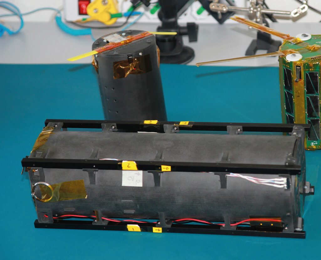 Two TubeSats and an additively
manufactured TuPOD during their
integration phase, made using
CRP’s Laser-Powder Bed Fusion
technology (Courtesy of GAUSS)