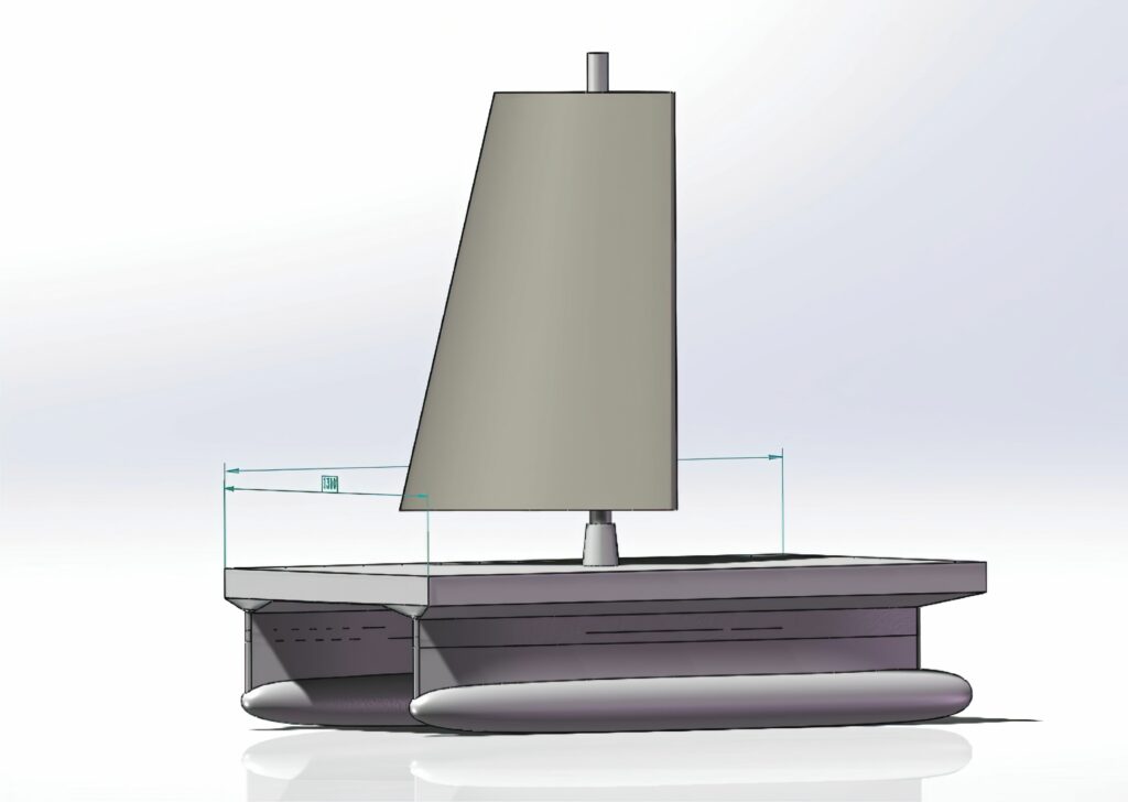 A twin hull vessel acts as a docking and charging station for autonomous underwater vehicles and UAVs