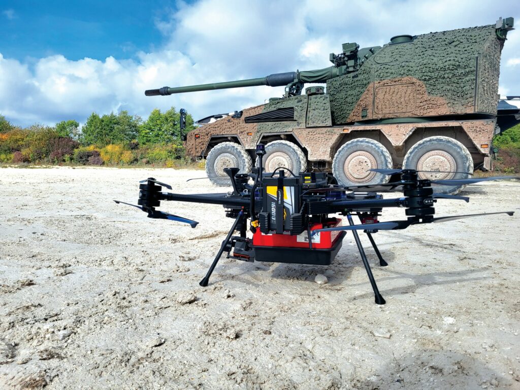 Sensus L8 carrying a Radarteam Sweden Cobra CBD ground penetrating radar primary payload, pictured with a Boxer remote controlled howitzer