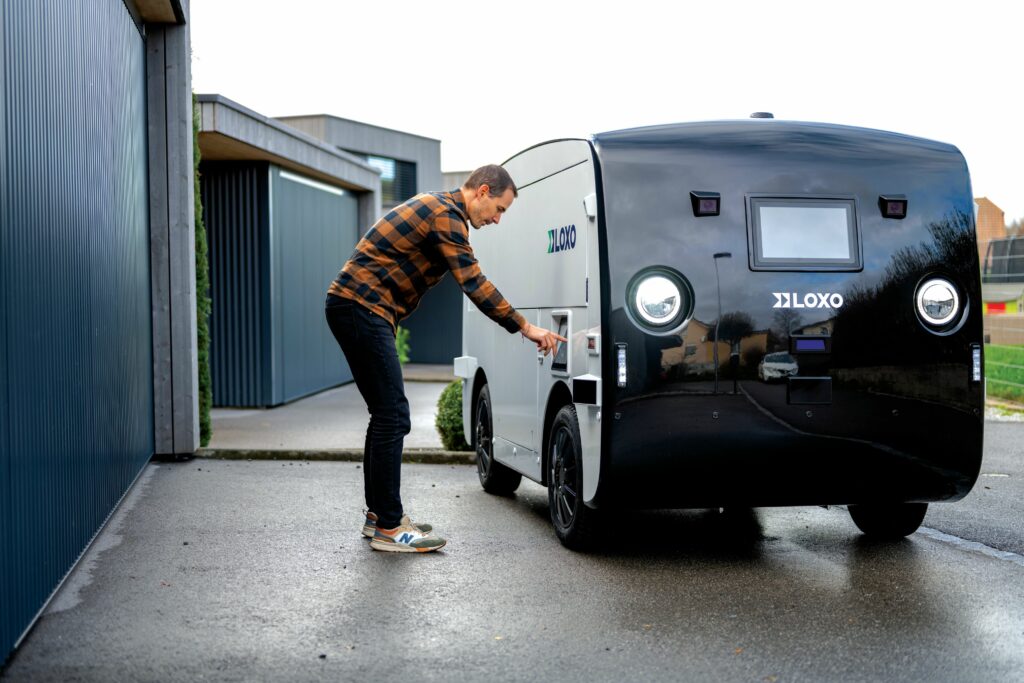 The LOXO Alpha is a 2 m-tall vehicle built largely from fibreglass composite. It is engineered to carry up to 350 kg and achieve a 45 kph maximum speed on its electric powertrain