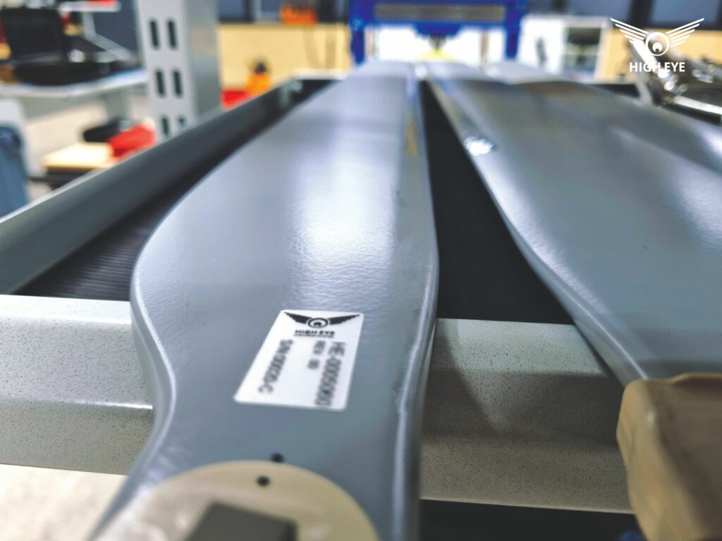 The rotor blades are precisely weight-balanced to prevent hover field imbalances during activation, and high-speed tape is typically applied to their leading edges for extra protection
